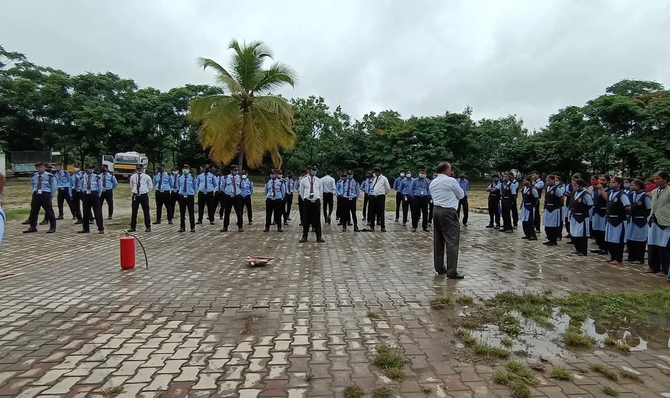 Trainees briefed before an outdoor fire safety drill