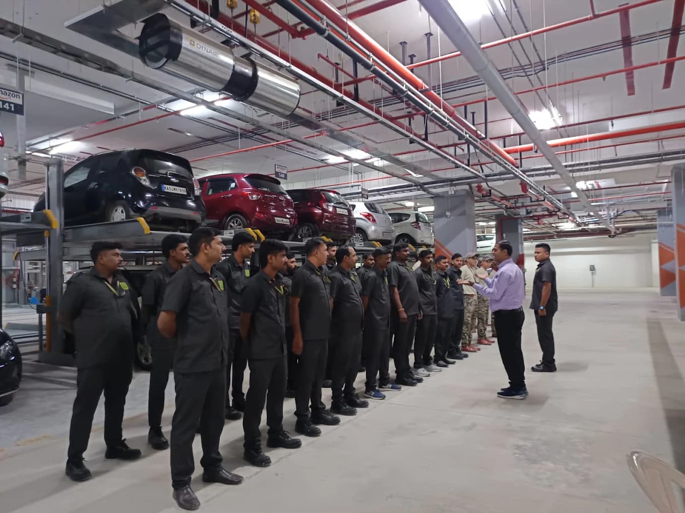 On-site muster briefing at a client's parking facility