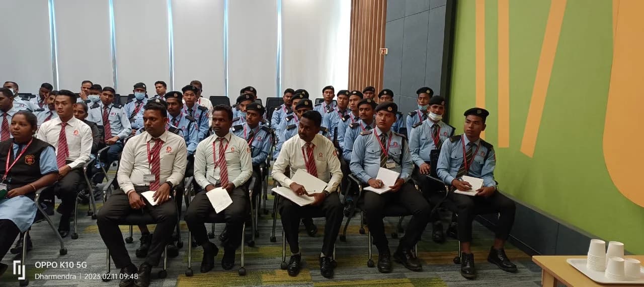 Trainees seated in a classroom training session